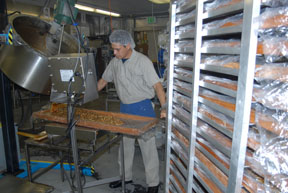 Washington State - Workers at Aplets & Cotlets tour craft apple creations